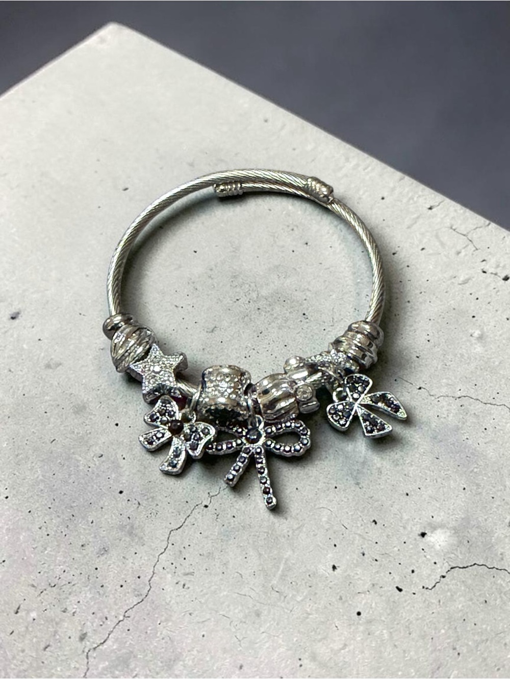 Silver Bow and Star Charm Adjustable Twisted Bangle - Women's Jewelry